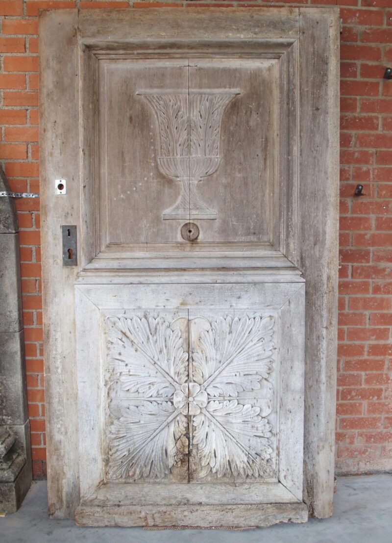 Heavy 19th Century French Walnut Entry Door with Carved Urn and Foliate Motifs