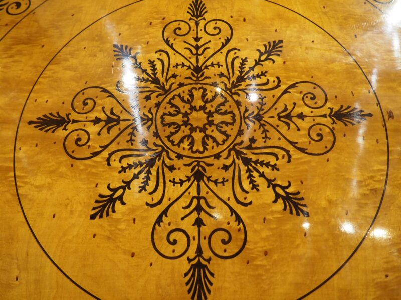 A 20th Century French Charles X Style Center Table with Marquetry Decor - Image 4