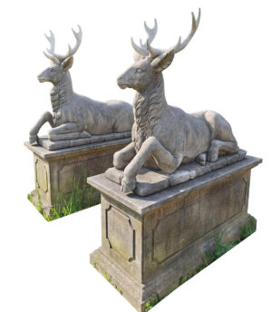 Pair of Large Carved Limestone Stags on Pedestals